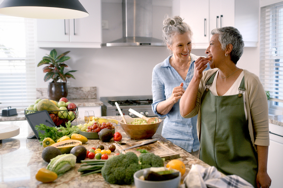 Two women cooking