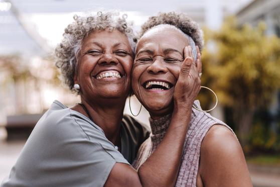 Two women smiling