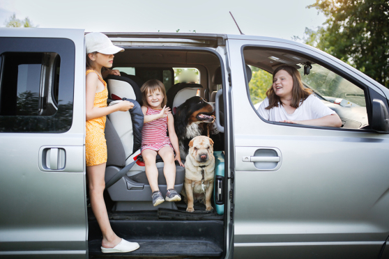 Family sitting in vehicle 